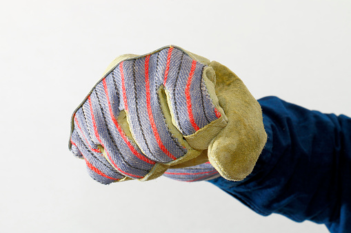 Hand with hand signal and work glove