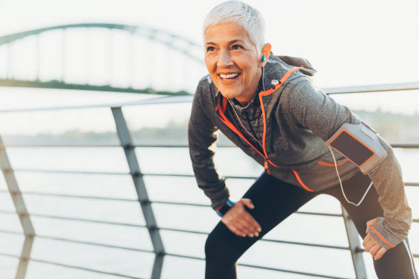 istock Joyful senior woman stretching 1134098299