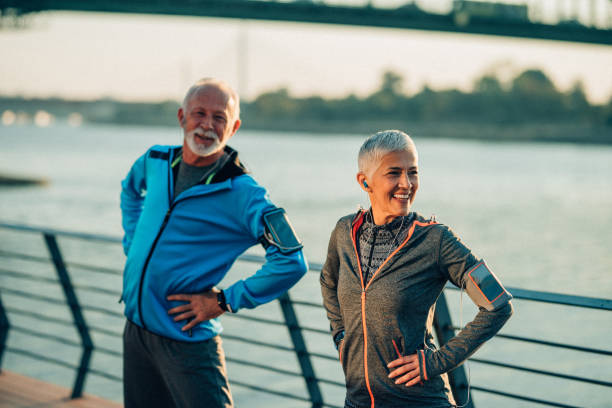 istock Senior couple doing exercises outdoors 1134098305