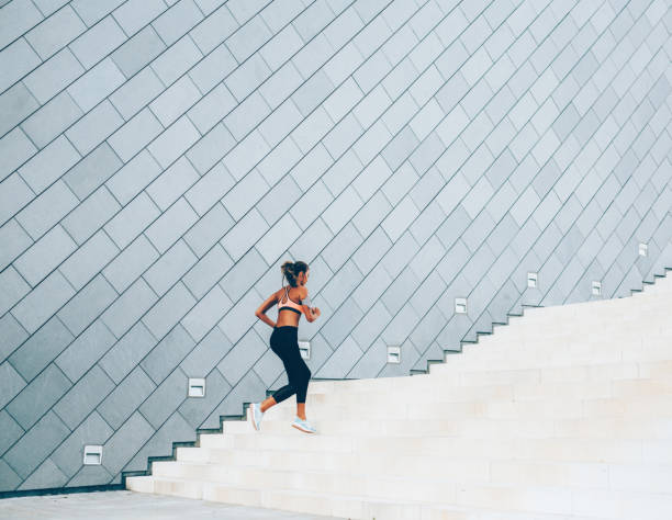 istock Running Up The Stairs 1134098317
