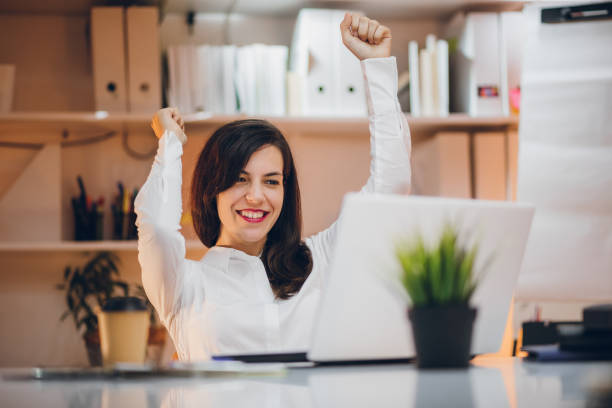 istock Businesswoman celebrating success 1134099299