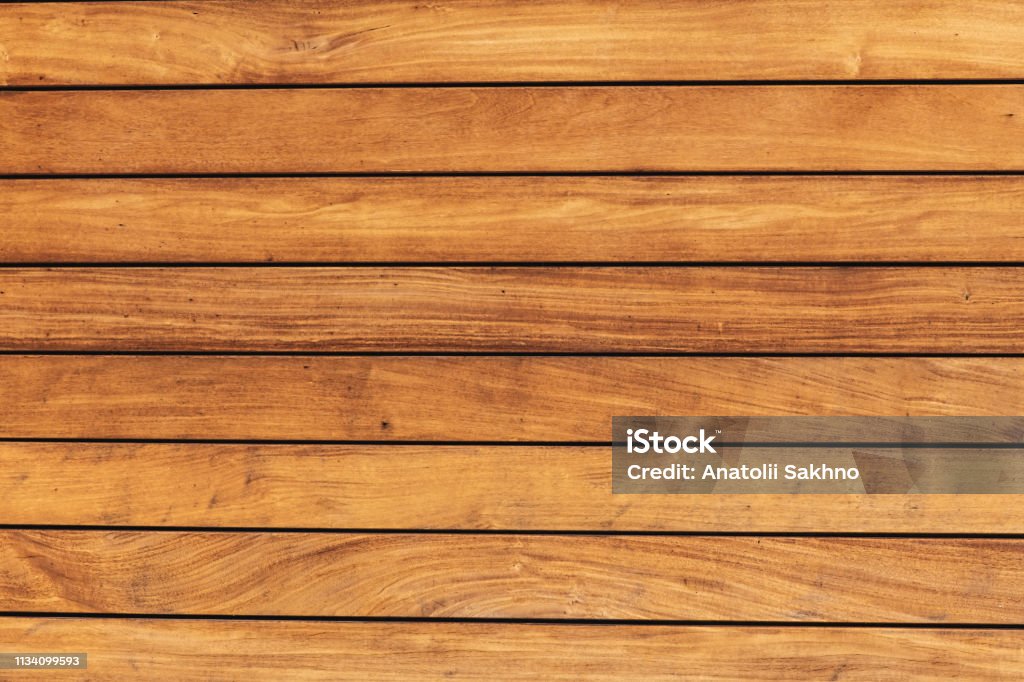 The texture of the pine boards. The texture of the pine boards. Horizontal wooden fence. Wood - Material Stock Photo