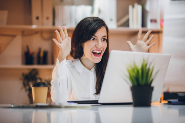 istock Businesswoman reads shocking news 1134099607