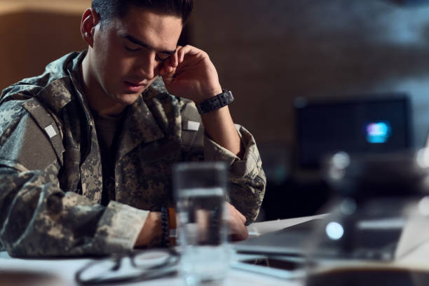 istock Young military officer feeling sad while being far away from home. 1134099808