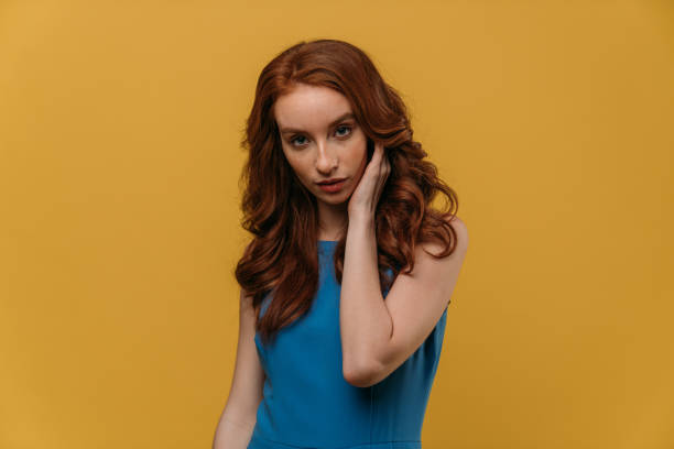 istock Woman model with ginger hair posing indoors 1134101096