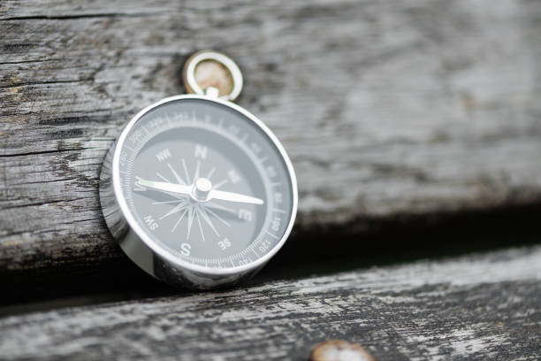 istock Compass on a beautiful wooden surface. Top view 1134101326