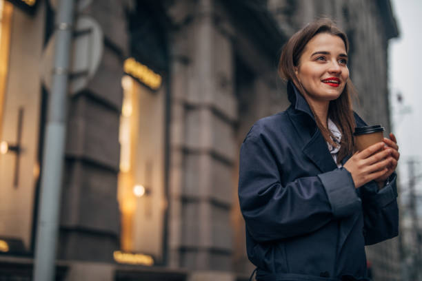 istock Pretty woman is drinking takeaway coffee 1134101395