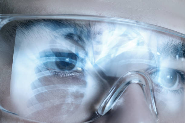 A male face in virtual reality glasses with ribbing image reflection on them.
