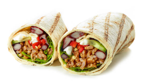 istock Tortilla wrap with fried minced meat and vegetables 1134104918