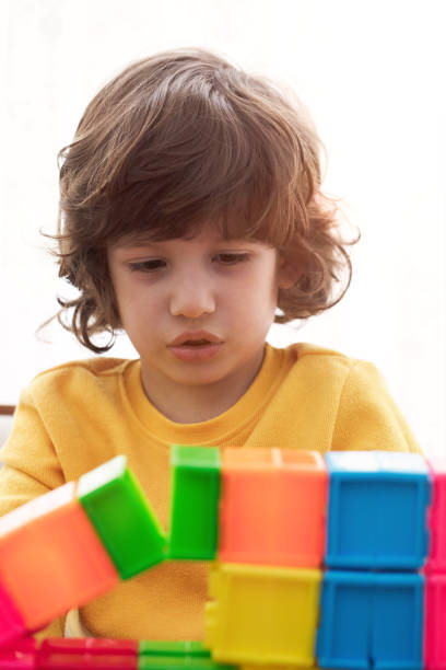 istock Happy child playing with Preschoolers Building Blocks 1134107294