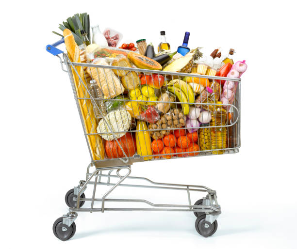 SHOPPING CART Shopping cart full of food cebolla stock pictures, royalty-free photos & images