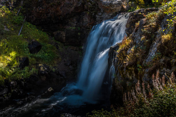 istock Yellowstone scenes in autumn - Crawfish waterfall 1134110940