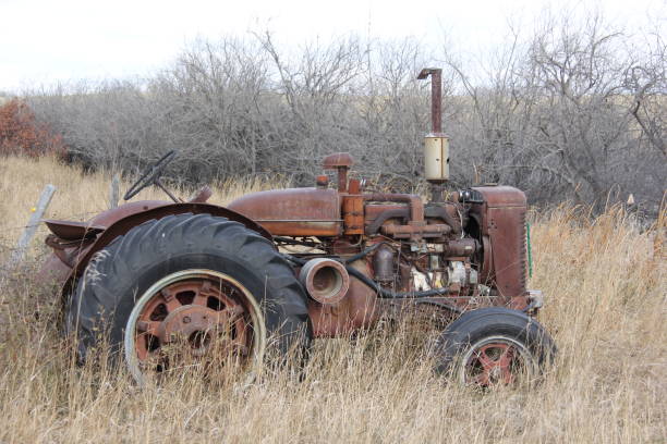 istock Abandoned Tractor in the Field by Andrea Lawrence C 1020377 1134117678