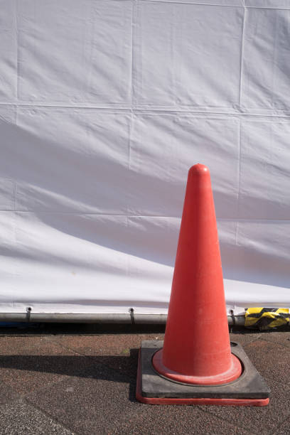 istock A red cone of the construction site on the road 1134120988