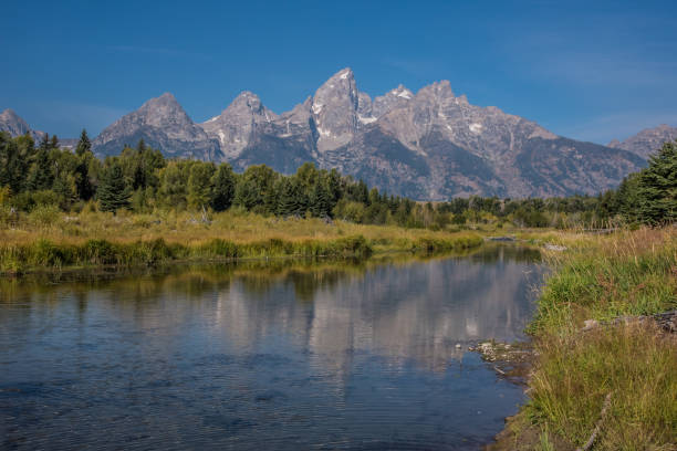 istock Grand Teton scenes in autumn with reflections 1134122173