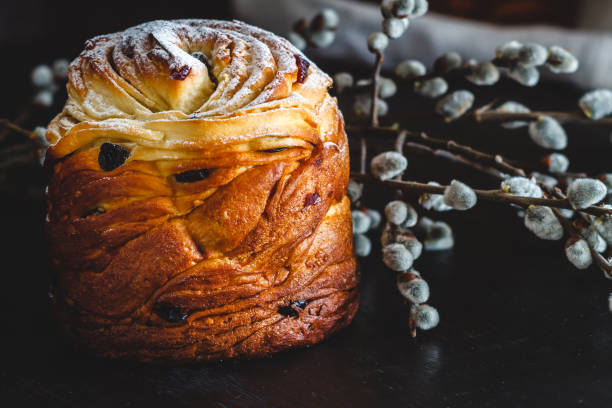 istock Easter cake kranch with icing sugar on a dark background and with willow flowers 1134123310