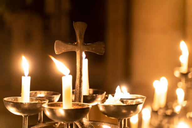 church candles burn in the church - church indoors inside of monastery imagens e fotografias de stock
