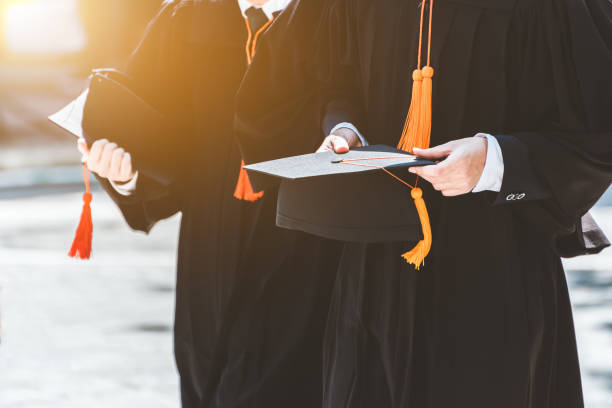 istock Close up Graduate holding a hat. Concept success education in University with copy space. 1134126984