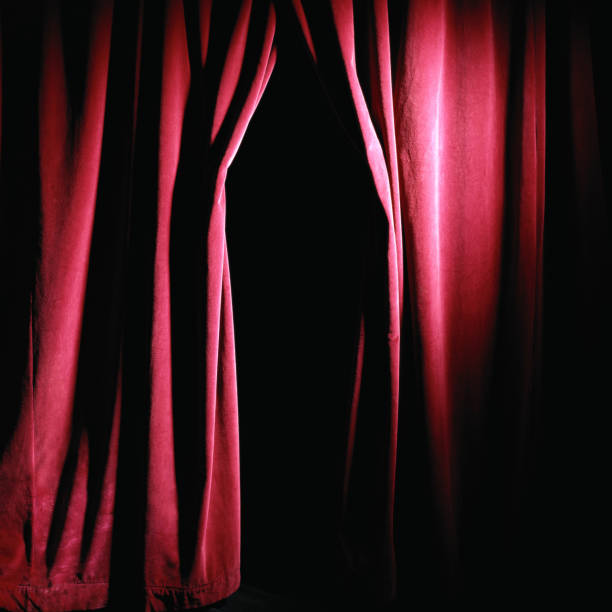 istock red theatre curtain cloth material texture background with opening in middle 1134151911