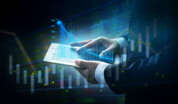 istock Businesses that work with tablet technology and financial concepts 1134152743