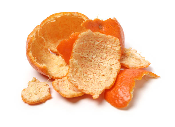 istock tangerine peel on white background 1134152856