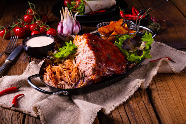 istock delicious pulled pork with baked potato quarters 1134157004