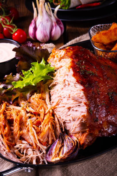 istock delicious pulled pork with baked potato quarters 1134157015