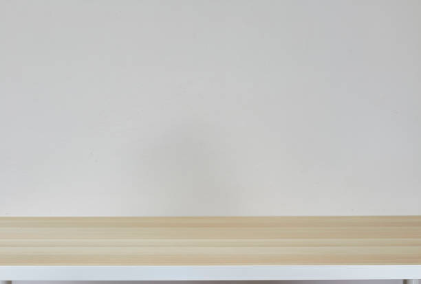 istock Empty top of natural light brown  table and grey concrete wall background 1134158069