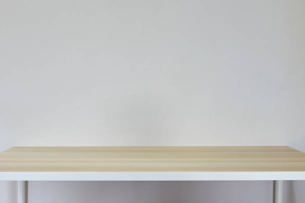 istock Empty top of natural light brown  table and grey concrete wall background 1134158078