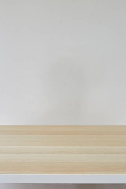 istock Empty top of natural light brown  table and grey concrete wall background 1134158095