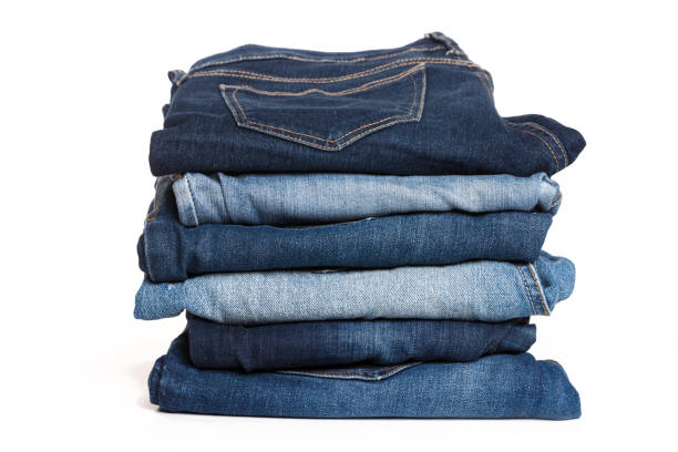 istock A stack of clothes jeans pants on a white background. Isolation 1134159029