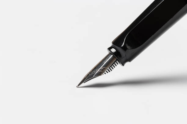 istock Black fountain pen isolated on white background 1134159219