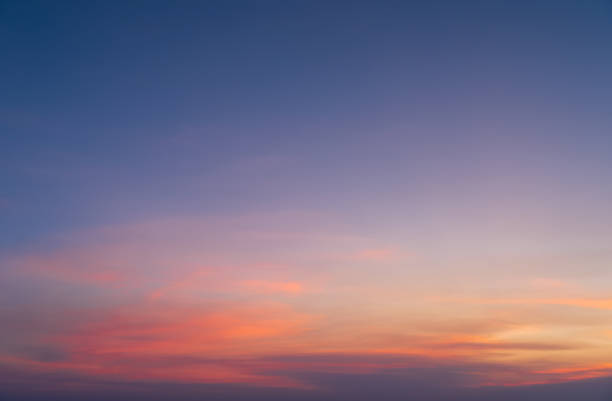 Abstract nature background. Dramatic blue sky with orange colorful sunset clouds in twilight time. Abstract nature background. Dramatic blue sky with orange colorful sunset clouds in twilight time. twilight stock pictures, royalty-free photos & images