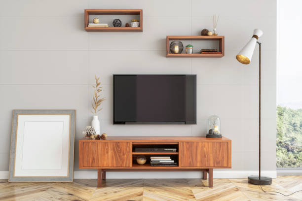 interieur-hipster smart tv und leeres bild-plakatrahmen - television stand stock-fotos und bilder