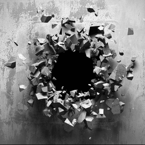 istock Dark cracked broken hole in concrete wall 1134166382