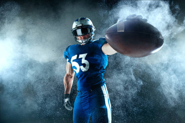 istock American football player on smoke background 1134167939