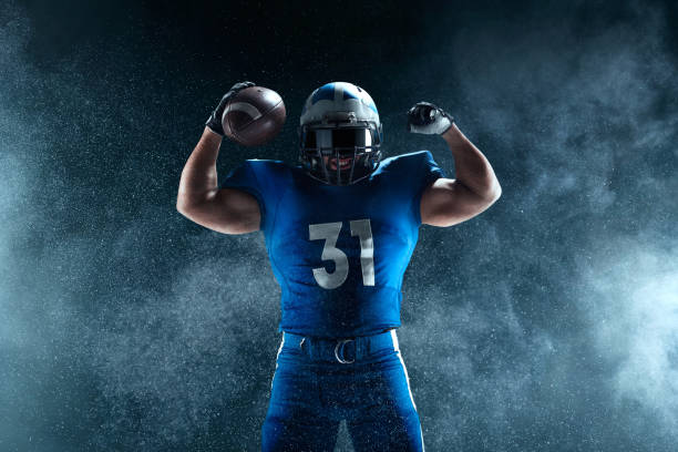 istock American football player on smoke background 1134167941