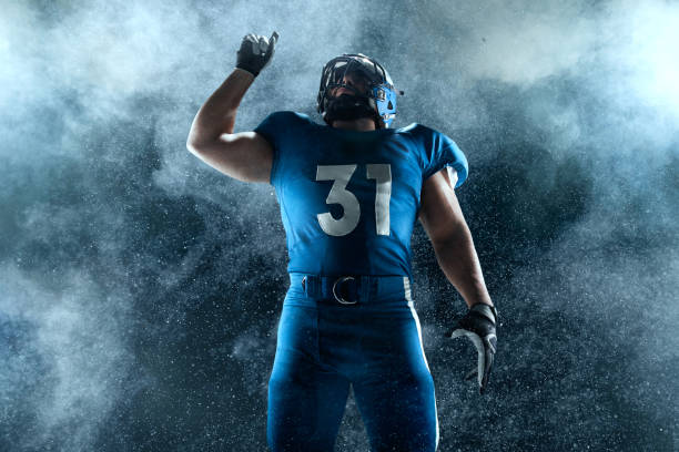 istock American football player on smoke background 1134167982