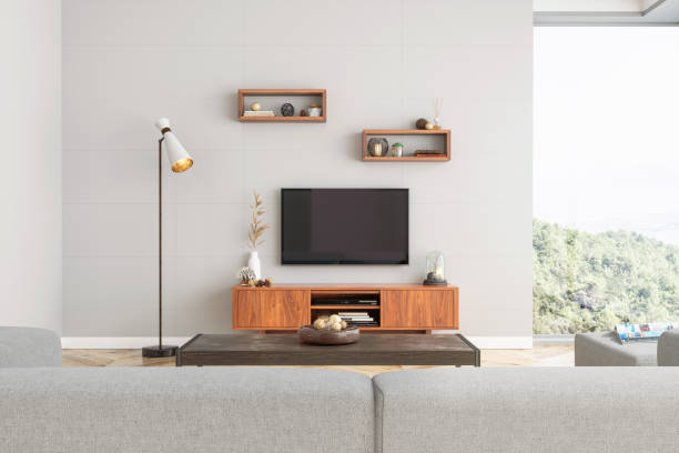 smart tv mockup mit leerem bildschirm im modernen wohnzimmer - television stand stock-fotos und bilder