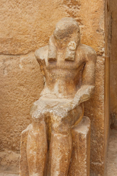 istock Old statue near pyramid temple in Giza, Cairo, Egypt 1134173992