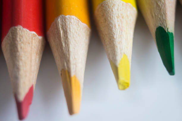 istock Colored pencils in rainbow colors close-up on white background 1134179982