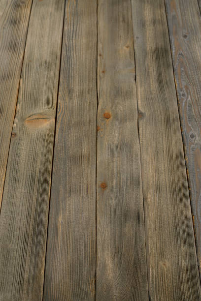 istock Old Rustic pine wooden texture  Knotted wood Gray - brown background 1134181397