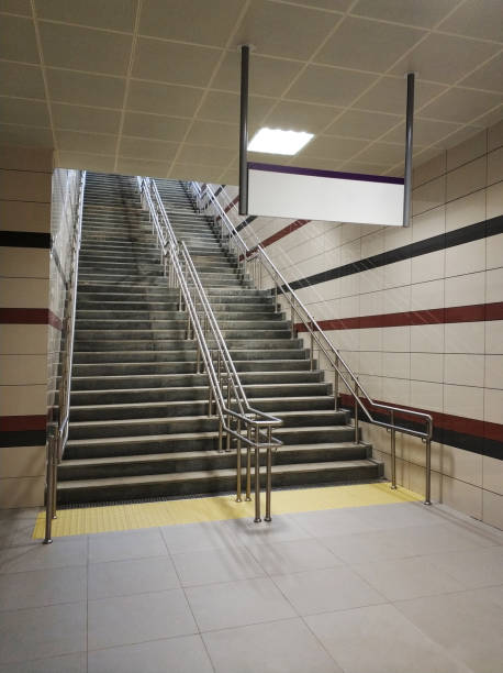 istock Indoor stairs and empty information or directional sign board 1134185426