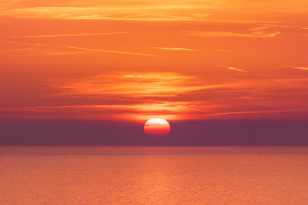 istock Stunning red sunset over the sea horizon. 1134186362