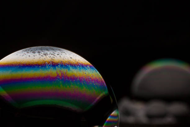 istock A bubble in rainbow colors on a black background. 1134187526