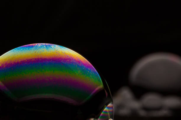 istock A bubble in rainbow colors on a black background. 1134187658