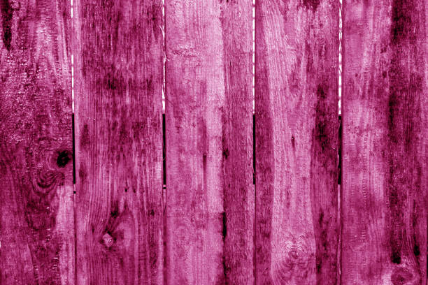 istock Old grunge wooden fence pattern in pink tone. 1134187819