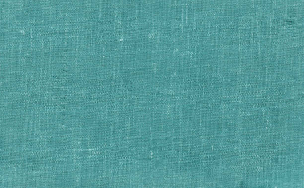 istock Old grungy canvas pattern with dirty spot in cyan color. 1134187933