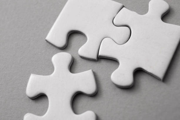 istock Close-up of white puzzle pieces 1134188031