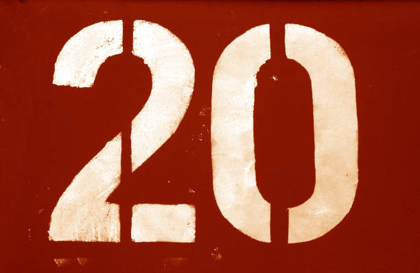 istock Number 20 in stencil on metal wall in orange tone. 1134188081